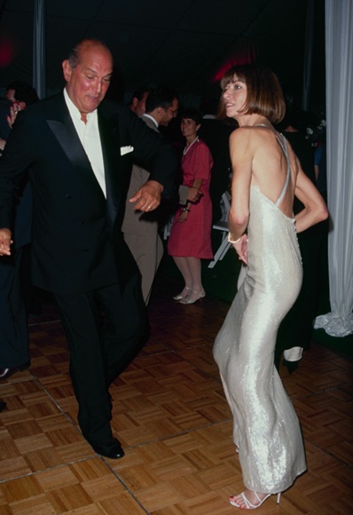 Anna Wintour dancing in a silver gown with Oscar de la Renta, 1990s