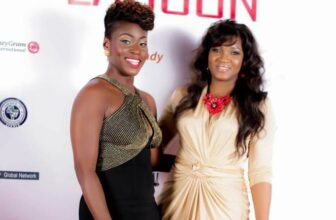 Omotola Jalade in Ejiro Amos Tafiri Celine Wrap Dress - Fashion Police Nigeria