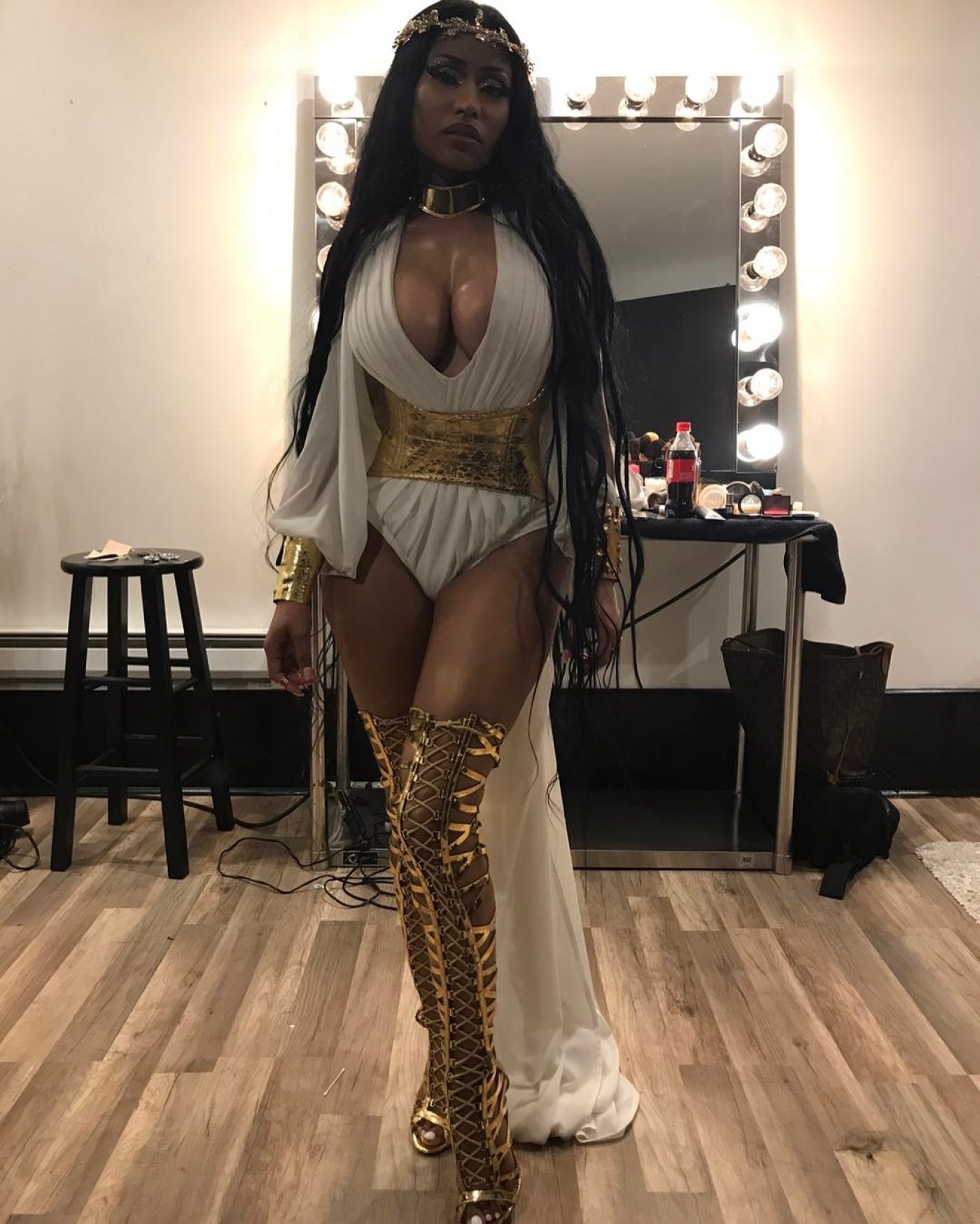 Nicki Minaj Looks Like A Roman Goddess Dripping In Gold Accessories.