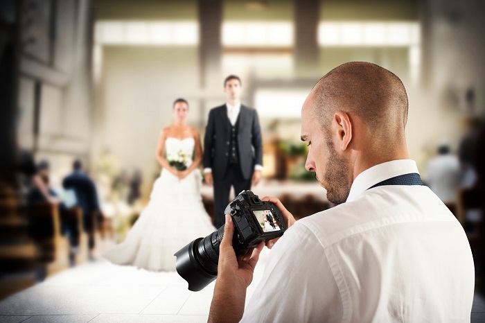 Photo of a wedding photographer 