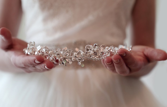 Photo of a bride showing off her beautiful tiara 