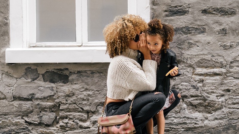 Mother Talking To Her Child