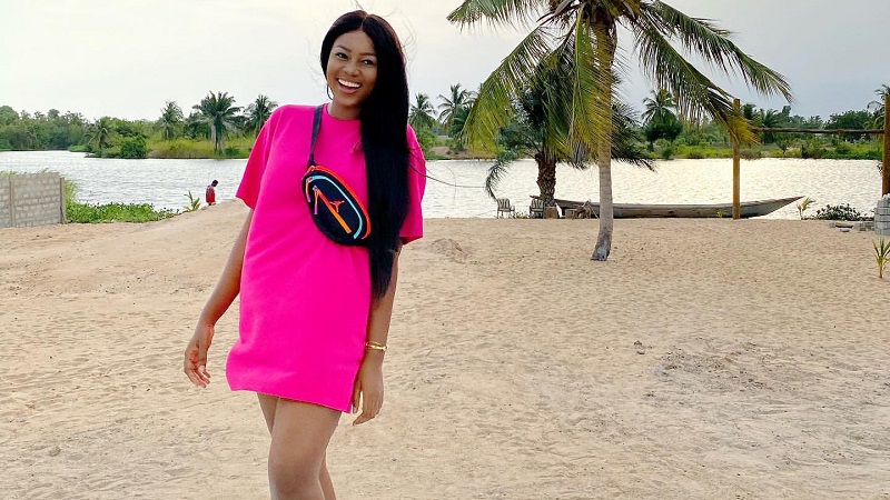 Yvonne Nelson Wearing Form-Fit Blue Dress