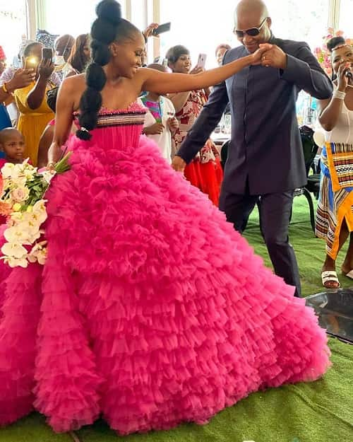 South African bride in a hot pink wedding dress - photo