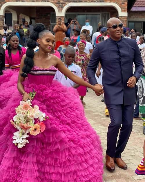 South African bride in a hot pink wedding dress - photo