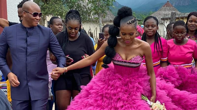South African bride in a hot pink wedding dress - photo