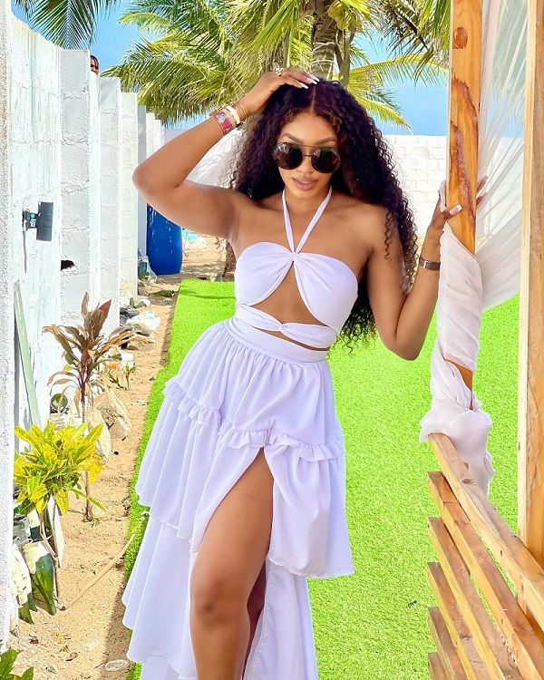 Sharon Ooja Looks Summer-Ready In White During A Beach Day Outing