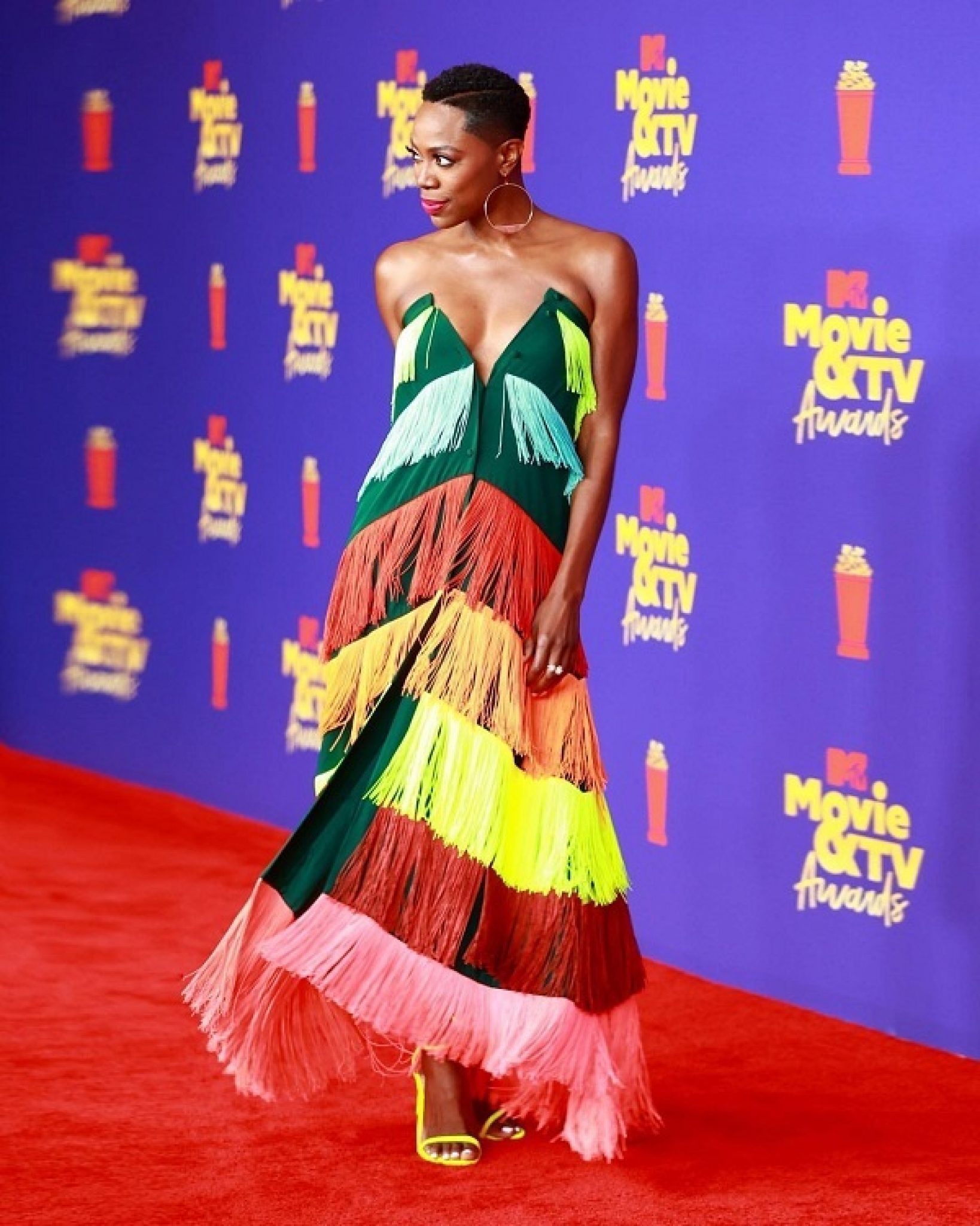 Yvonne Orji Shines In A Rainbow Dress At The 2021 MTV Movie and TV