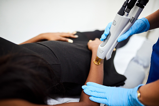 Woman Getting Laser Hair Removal In A Beauty Clinic