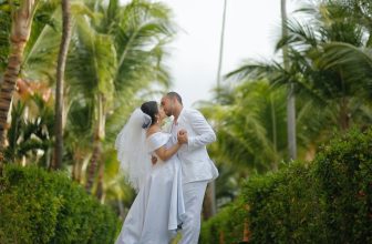 Bride and Groom Kissing At Wedding Venue