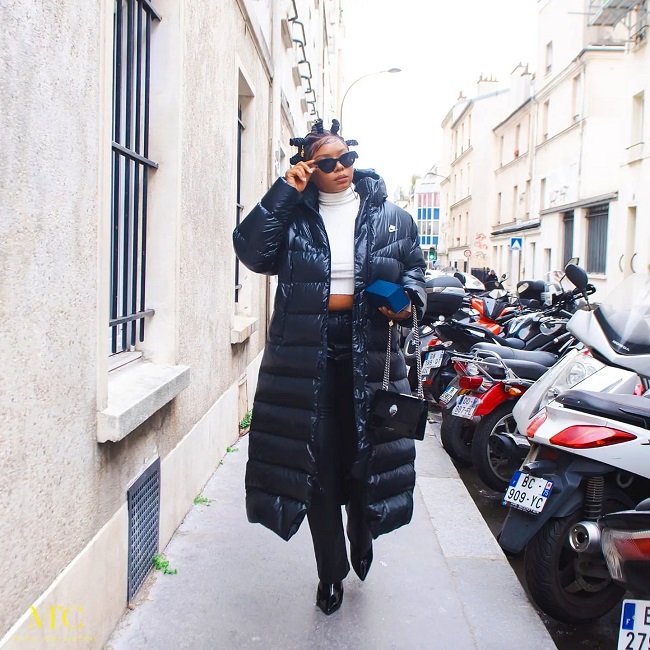 Yemi Alade Takes The Streets Of Paris In Bantu Knots And Puffer Jacket