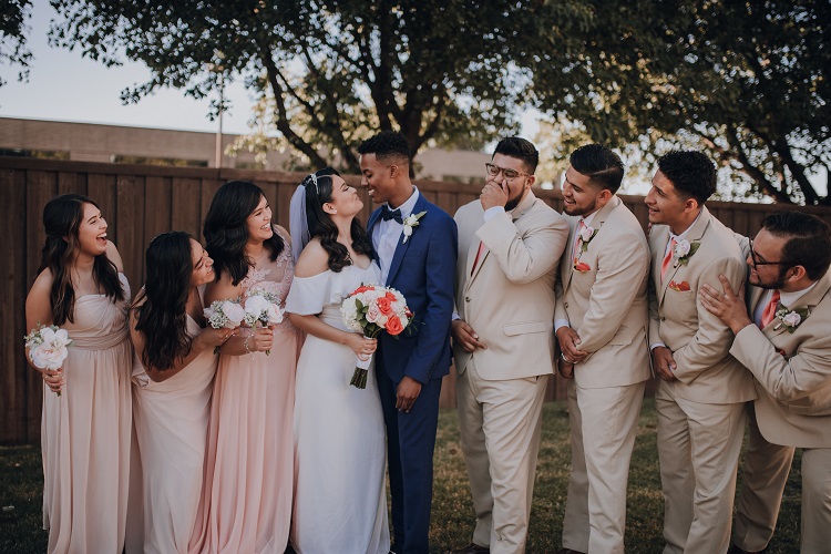 Photo of Bride and Groom With Bridesmaids and Groomsmen