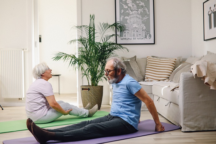 Photo of husband and wife exercising or working out together