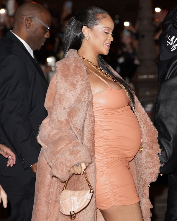 Rihanna Wraps Up Her Baby Bump In A Clingy Leather Mini Dress