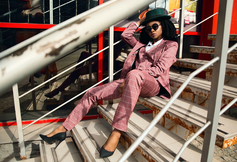 African American Woman Wearing Plaid Pantsuit