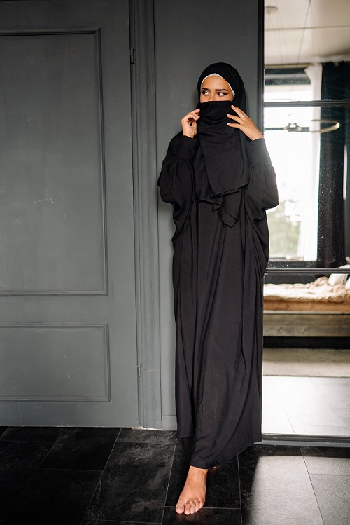 Woman Wearing Abaya Inside A Room