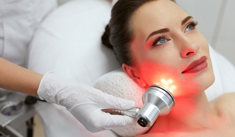 Photo of a woman having a facial beauty treatment