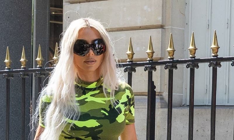 Kim Kardashian Wearing Neon Camo top with Leggings in Paris Image