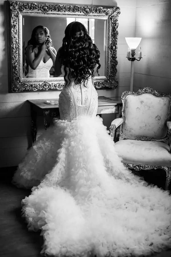Photo of bride prepping herself
