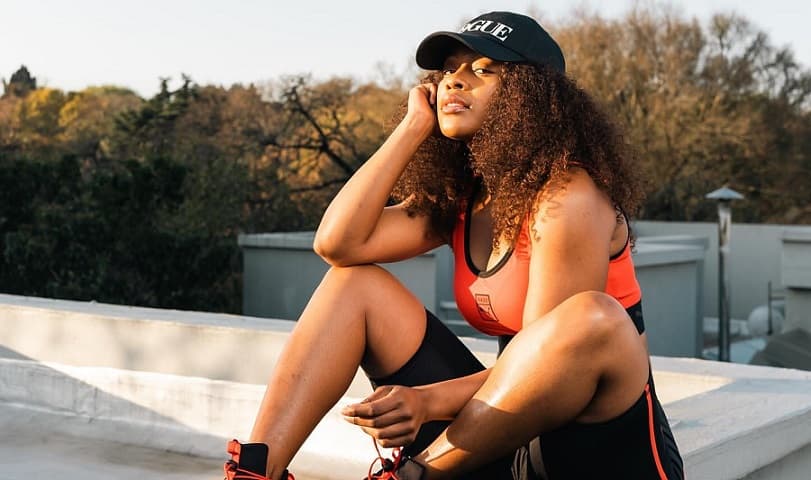 South African actress, Nomzamo Mbatha modeling the new PUMA x VOGUE Summer 2022 collection