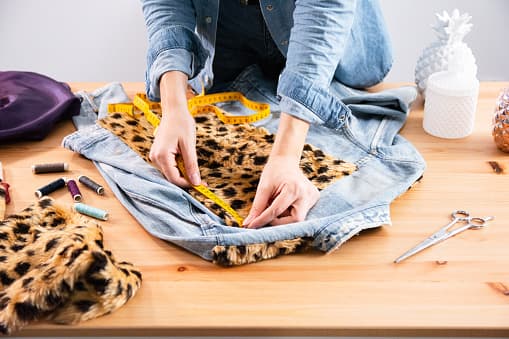 Photo of woman upcycling her dress