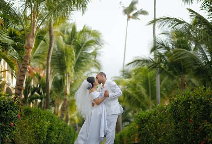 Cute photo of bride and groom kissing 