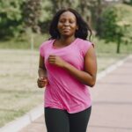 African American woman jogging exercise