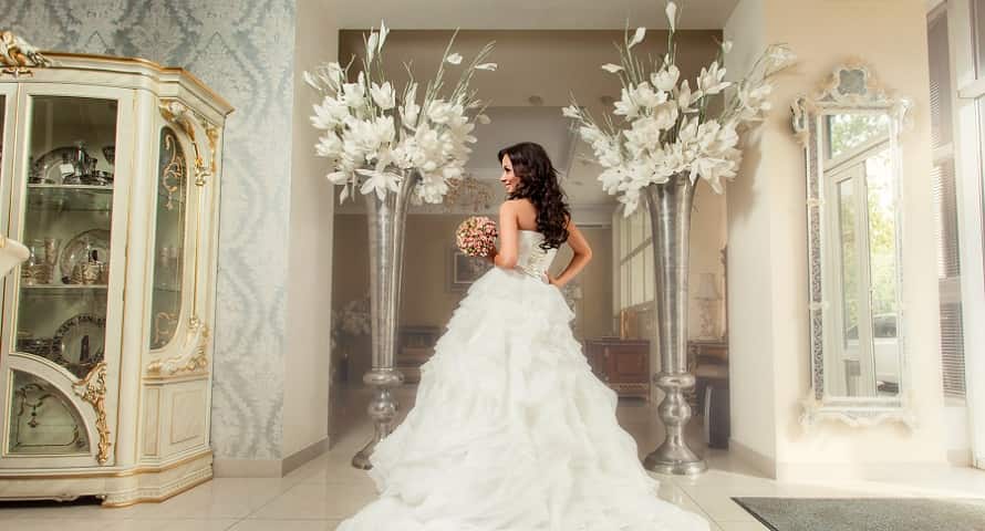 Photo of a bridal shop showing woman in her wedding gown and dress - Fashion Police Nigeria