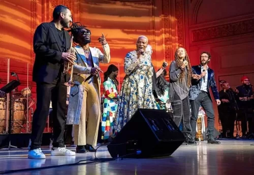 Grammy Award winner Angelique Kidjo performing on stage - Fashion Police Nigeria