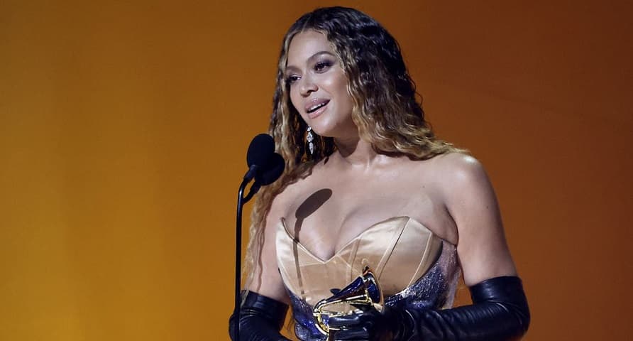Beyonce stunning silver gown during her acceptance speech at the 2023 Grammys