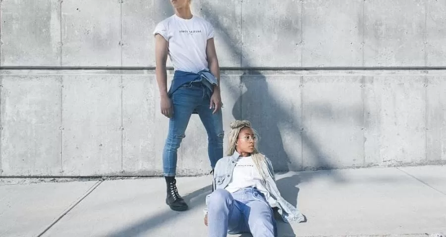 Man and woman wearing denim and white shirt look - Fashionpoliceng.com