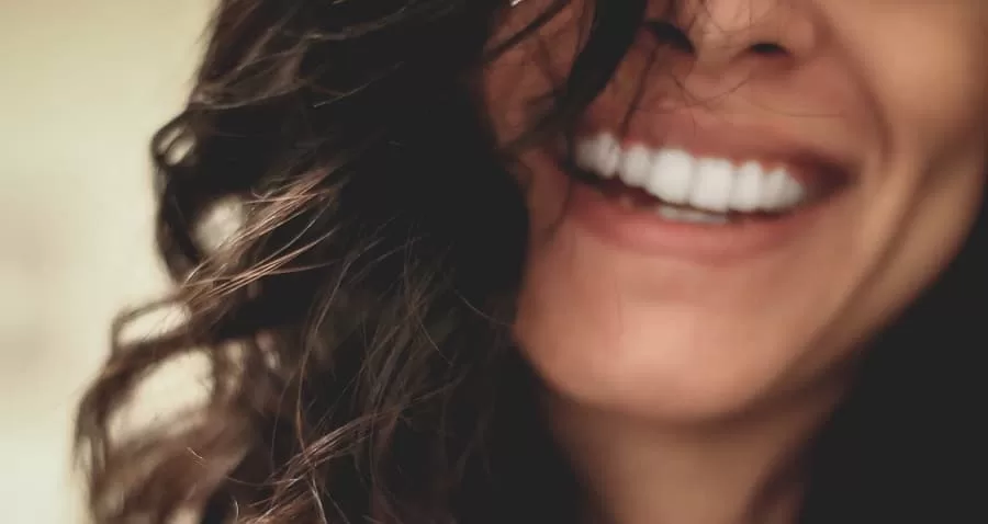 Woman teeth whitening shining smile