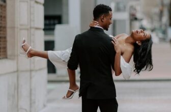 Groom lifting bride destination wedding photo - Fashion Police Nigeria