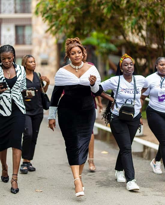 Omotola Jalade Black Dress Women of Valour International Women's Day Event Photo in Ghana