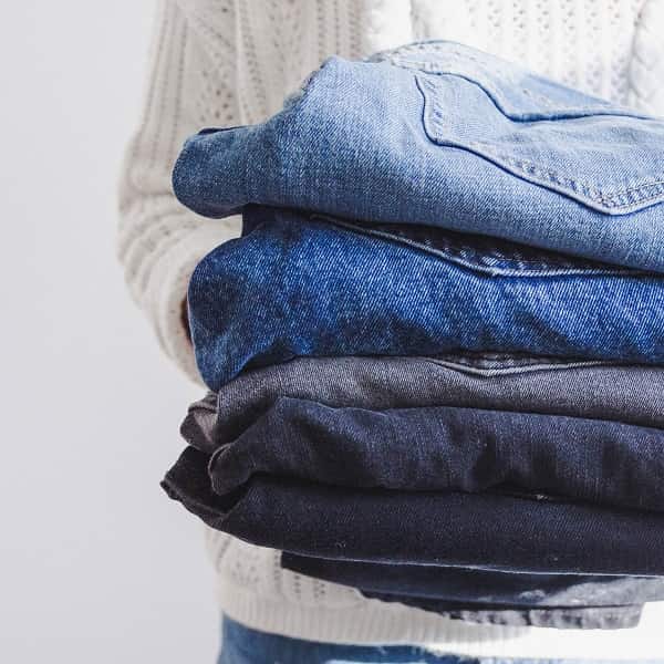 Photo of collection of denim jeans