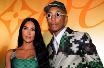 Kim Kardashian Wears “Damoflage Print” Athleisure to Support Pharrell Williams’ Louis Vuitton Paris Fashion Week Show