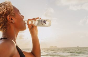 Photo of African American woman drinking water - Fashion Police Nigeria