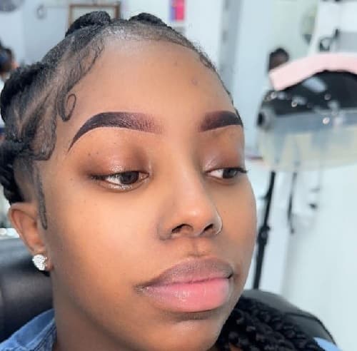 African American woman eyebrow tinting photo