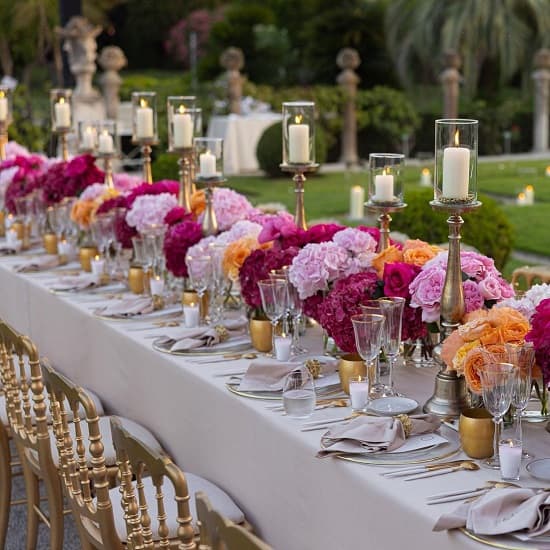 Beautiful pink wedding floral arrangement on the table - Fashion Police Nigeria