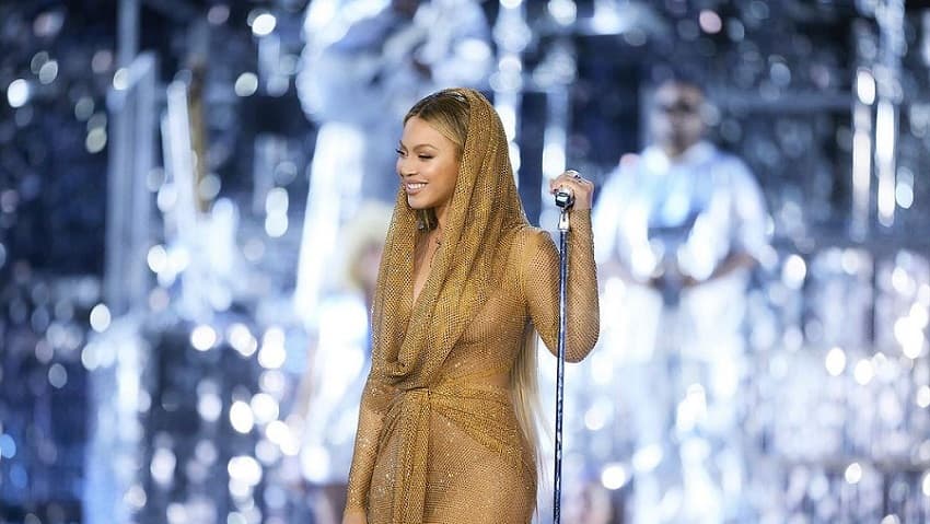 Beyonce Wore A Glamorous Golden Wrap Dress For Her Detroit Renaissance Tour  | FPN