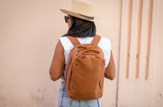 Photo of African American woman wearing a backpack - Fashion Police Nigeria