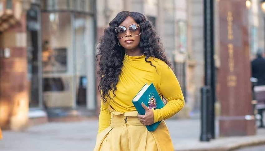 African American woman wearing mix and match yellow monochrome fashion