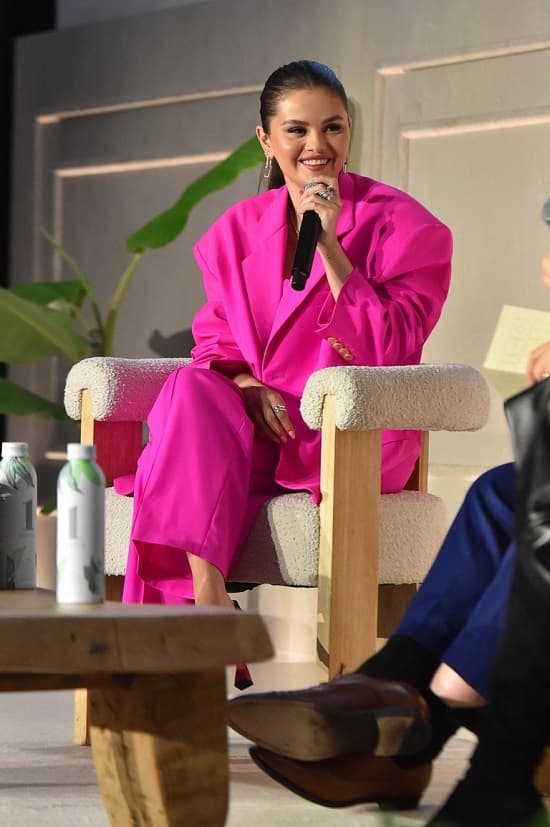 Selena Gomez hot pink pantsuit at Universal Music Group and Thrive Global’s Music and Health conference in LA - Fashion Police Nigeria