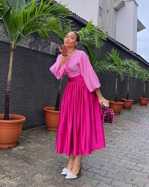 Photo of African woman posing in pink clothing - Fashion Police Nigeria