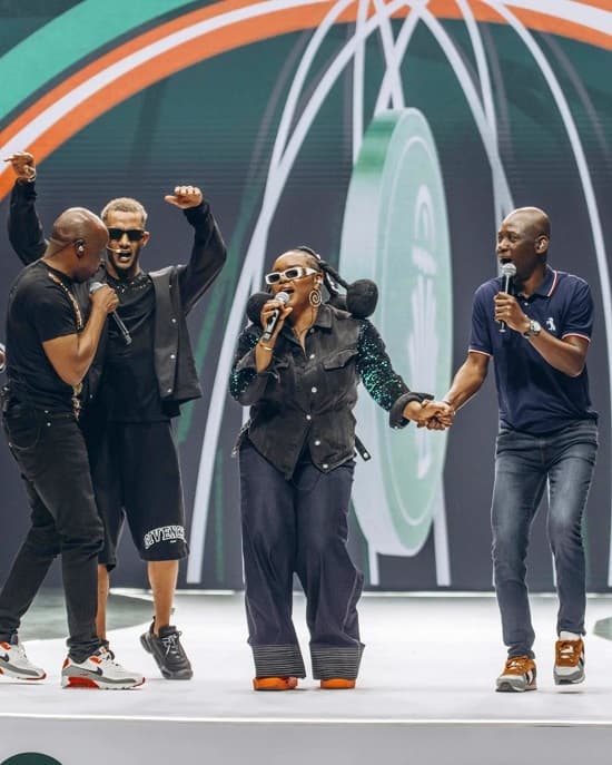 Yemi Alade wears denim jacket and denim baggy pants to sing Akwaba, the official CAF 2023 anthem, alongside Magic Systems band and Mohamed Ramadan