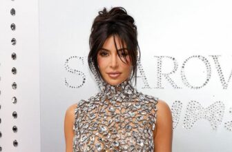 Kim Kardashian wears Swarovski chain top and mini skirt at the brand flagship store opening in New Fifth Avenue in New York City - Fashion Police Nigeria