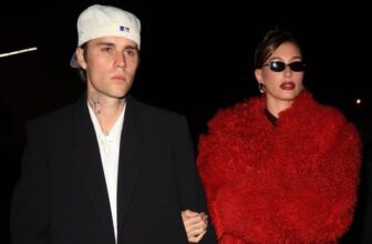 Hailey Bieber's Festive Date Night Look Includes a Cherry-Red Fur Coat and Matching Lips