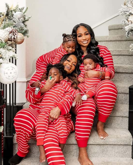 Family photo in matching Christmas pajamas trend - Fashion Police Nigeria