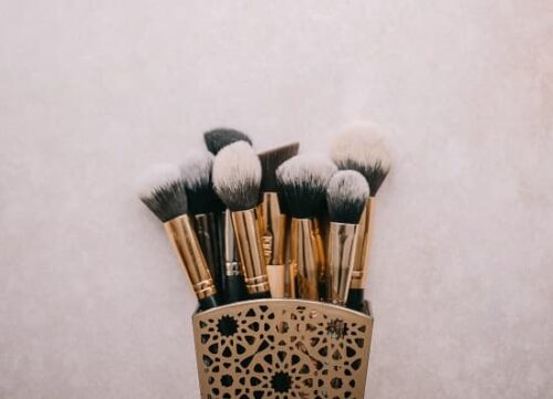 Photo of makeup brushes in a vertical storage - Fashion Police Nigeria 
