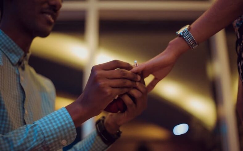 Photo of African American man proposing to his girlfriend - Fashion Police Nigeria